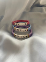 Cargar imagen en el visor de la galería, PULSERA SMILE LILA TAMAÑO ADULT &amp; KID
