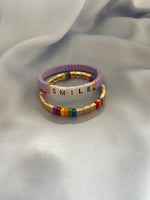 Cargar imagen en el visor de la galería, PULSERA SMILE LILA TAMAÑO ADULT &amp; KID
